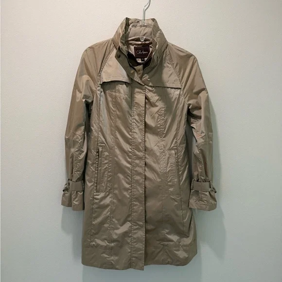 Cole Haan Chic Rain Coat with back bow & hideaway hood. Iridescent beige in XS. - Picture 1 of 13